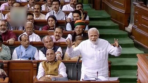 Prime Minister Narendra Modi speaks in the Lok Sabha on no-confidence motion during the Monsoon Session of Parliament, in New Delhi on Friday. (PTI) Prime Minister Narendra Modi speaks in the Lok Sabha on no-confidence motion during the Monsoon Session of Parliament, in New Delhi on Friday. (PTI)