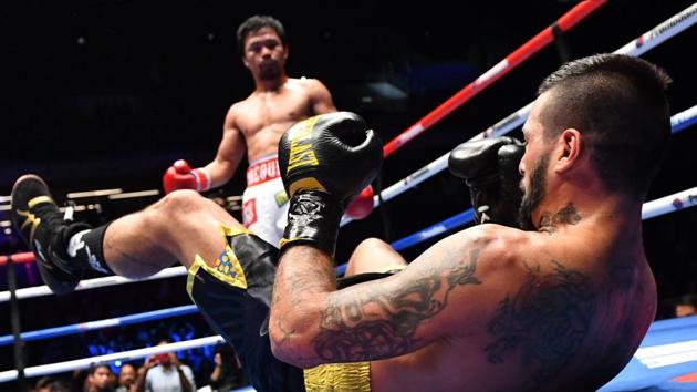Argentina’s Lucas Matthysse reacts after he was knocked down by Philippines’ Manny Pacquiao during their world welterweight boxing championship bout at Axiata Arena in Kuala Lumpur, Malaysia. (Mohd Rasfan / AFP) Argentina’s Lucas Matthysse reacts after he was knocked down by Philippines’ Manny Pacquiao during their world welterweight boxing championship bout at Axiata Arena in Kuala Lumpur, Malaysia. (Mohd Rasfan / AFP)