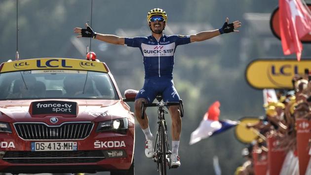 France’s Julian Alaphilippe celebrates as he crosses the finish line to win the tenth stage between Annecy and Le Grand-Bornand, French Alps, on July 17, 2018. (Marco BERTORELLO / AFP) France’s Julian Alaphilippe celebrates as he crosses the finish line to win the tenth stage between Annecy and Le Grand-Bornand, French Alps, on July 17, 2018. (Marco BERTORELLO / AFP)
