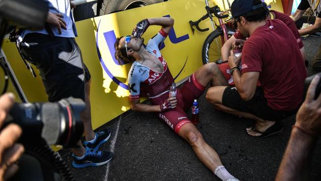 Germany's Rick Zabel drinks after he crossed the finish line to place 162nd and last of the eleventh stage between Albertville and La Rosiere, French Alps, on July 18, 2018. (Marco BERTORELLO / AFP) Germany's Rick Zabel drinks after he crossed the finish line to place 162nd and last of the eleventh stage between Albertville and La Rosiere, French Alps, on July 18, 2018. (Marco BERTORELLO / AFP)