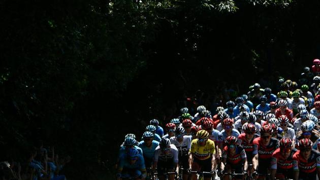 Belgium's Greg Van Avermaet (C) and riders of the pack ride through a forest during the fifth stage of the cycling race on July 11, 2018. (Philippe Lopez / AFP) Belgium's Greg Van Avermaet (C) and riders of the pack ride through a forest during the fifth stage of the cycling race on July 11, 2018. (Philippe Lopez / AFP)