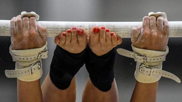 A Puerto Rican gymnast trains on the eve of the inauguration of the 2018 Central American and Caribbean Games (CAC) in Barranquilla, Colombia. (Luis Acosta / AFP) A Puerto Rican gymnast trains on the eve of the inauguration of the 2018 Central American and Caribbean Games (CAC) in Barranquilla, Colombia. (Luis Acosta / AFP)