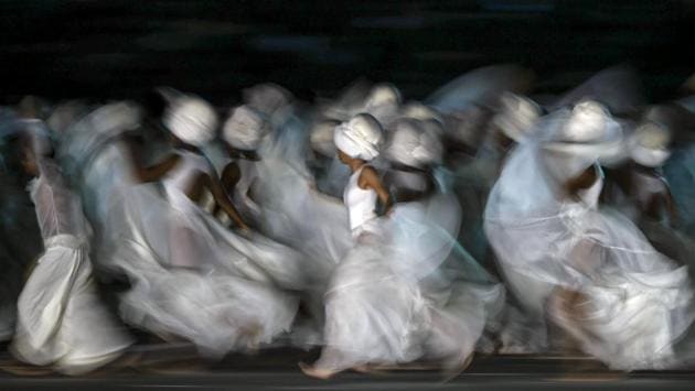 Artists perform during the opening ceremony of the 2018 Central American and Caribbean Games (CAC), at the Metrpolitano stadium in Barranquilla, Colombia. The games will run until August 03, with more than 5,000 athletes from 37 countries taking part. (Luis Robayo / AFP) Artists perform during the opening ceremony of the 2018 Central American and Caribbean Games (CAC), at the Metrpolitano stadium in Barranquilla, Colombia. The games will run until August 03, with more than 5,000 athletes from 37 countries taking part. (Luis Robayo / AFP)