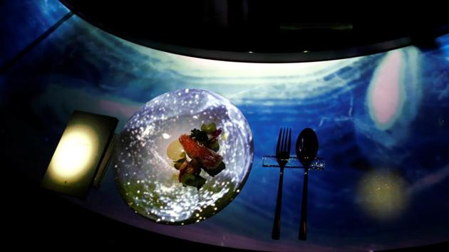 A course at the restaurant paired with its projection mapping. A meal at Tree by Naked is divided in to six courses, each paired with a phase of the tree’s life and its experience augmented with the immersive aids at hand. (Kim Kyung-Hoon / REUTERS) A course at the restaurant paired with its projection mapping. A meal at Tree by Naked is divided in to six courses, each paired with a phase of the tree’s life and its experience augmented with the immersive aids at hand. (Kim Kyung-Hoon / REUTERS)