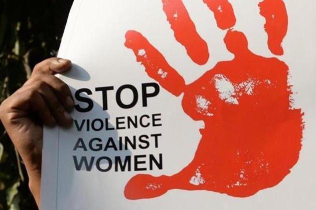 (FILES) This file photo taken on February 21, 2017 shows a social activist holding placards during a protest against a rape at Hauz Khas village in New Delhi. (AFP) (FILES) This file photo taken on February 21, 2017 shows a social activist holding placards during a protest against a rape at Hauz Khas village in New Delhi. (AFP)