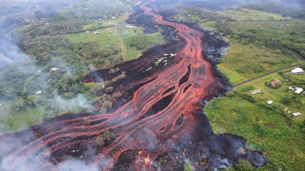 Pahoa, which is just a few miles from where the volcano is pumping a river of molten rock into the ocean, serves as a gateway to Hawaii Volcanoes National Park, which is normally the state’s most popular tourist attraction but has closed indefinitely. “Our town is dying very, very fast and very, very dramatically,” said State Sen. Russell Ruderman, who owns a natural foods store in Pahoa. (US Geological Survey via AP FIle) Pahoa, which is just a few miles from where the volcano is pumping a river of molten rock into the ocean, serves as a gateway to Hawaii Volcanoes National Park, which is normally the state’s most popular tourist attraction but has closed indefinitely. “Our town is dying very, very fast and very, very dramatically,” said State Sen. Russell Ruderman, who owns a natural foods store in Pahoa. (US Geological Survey via AP FIle)