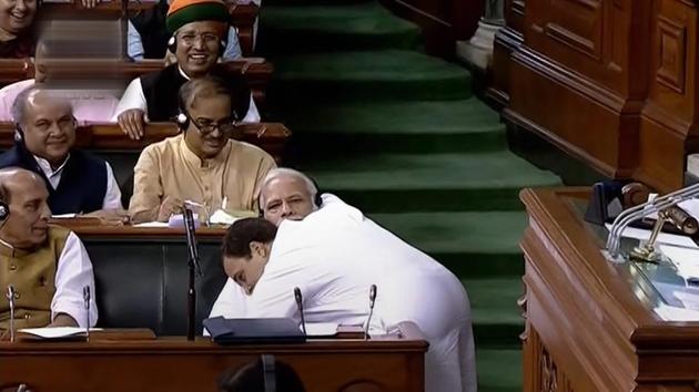 Congress President Rahul Gandhi hugs Prime Minister Narendra Modi after his speech in the Lok Sabha on 'no-confidence motion' during the Monsoon Session of Parliament, in New Delhi on Friday, July 20, 2018.(PTI)