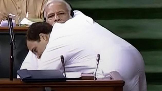 Congress president Rahul Gandhi hugs Prime Minister Narendra Modi after his speech in the Lok Sabha on 'no-confidence motion' during the Monsoon Session of Parliament, New Delhi, July 20(PTI)