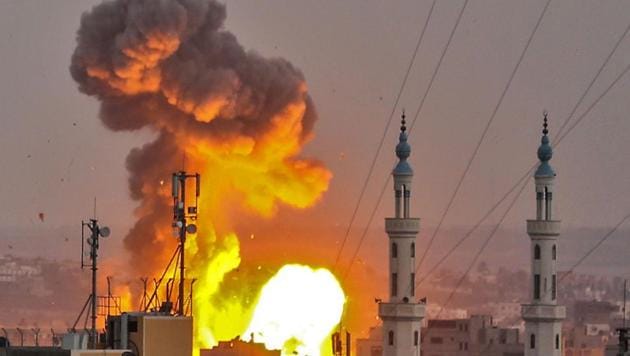 A picture taken on July 20, 2018 shows a fireball exploding in Gaza City during Israeli bombardment. Israeli aircraft and tanks hit targets across the Gaza Strip on July 20 after shots were fired at troops on the border, the army said, with Hamas reporting several members of its military wing killed in the latest flare-up in months of tensions.(AFP)