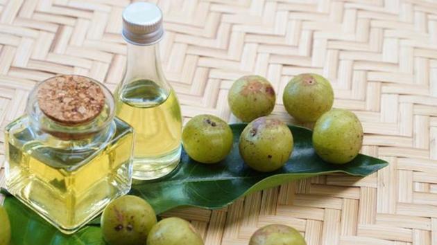 In clinical studies, the Indian gooseberry has been shown to have a hypolipidemic effect in reducing triglycerides and cholesterol. Amla is rich in essential amino acids and antioxidants, all of which help lower bad cholesterol levels. (Shutterstock) In clinical studies, the Indian gooseberry has been shown to have a hypolipidemic effect in reducing triglycerides and cholesterol. Amla is rich in essential amino acids and antioxidants, all of which help lower bad cholesterol levels. (Shutterstock)