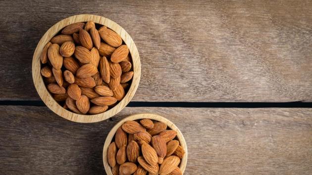 Almonds are the most nutritionally dense nut, and are loaded with Vitamin E, potassium, calcium, magnesium and iron. “Studies have shown that eating almonds has a beneficial effect on lowering cholesterol along with bad cholesterol. (Shutterstock) Almonds are the most nutritionally dense nut, and are loaded with Vitamin E, potassium, calcium, magnesium and iron. “Studies have shown that eating almonds has a beneficial effect on lowering cholesterol along with bad cholesterol. (Shutterstock)