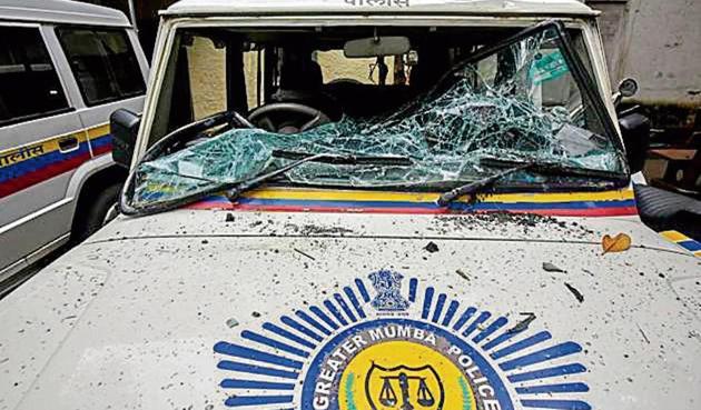 A police car vandalised by the mob on Sunday.(Kunal Patil/HT Photo)