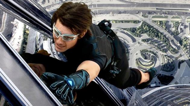Tom Cruise hangs off the Burj Khalifa in Mission: Impossible - Ghost Protocol. Tom Cruise hangs off the Burj Khalifa in Mission: Impossible - Ghost Protocol.