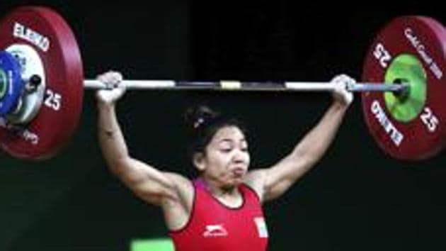 Mirabai Chanu lifted a personal best of 196kg (86kg snatch, 110kg jerk), a national record, to win the Commonwealth Games title.(AP)