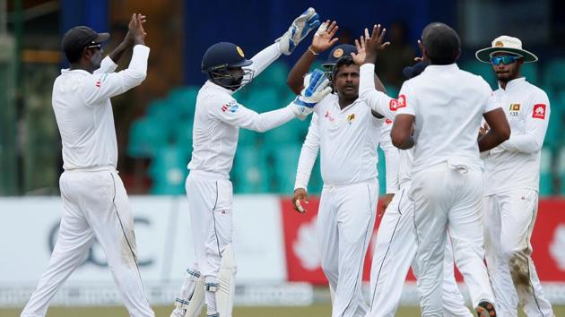 Sri Lanka's Rangana Herath (C) celebrates with his teammates after taking the wicket of South Africa's Theunis de Bruyn (not pictured) at Colombo, Sri Lanka on July 23, 2018. (REUTERS) Sri Lanka's Rangana Herath (C) celebrates with his teammates after taking the wicket of South Africa's Theunis de Bruyn (not pictured) at Colombo, Sri Lanka on July 23, 2018. (REUTERS)