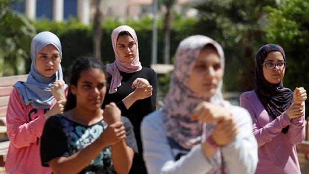 Egyptian women during a training session. It is uncommon for women to play such sports on the streets in Egypt. A 2017 Thomson Reuters Foundation survey of experts on how women fared in mega cities rated Cairo as the world’s most dangerous megacity for women, while London came out as best. (Amr Abdallah Dalsh / REUTERS)