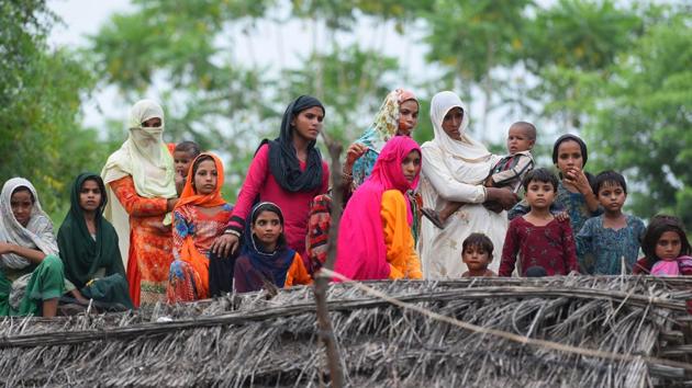 Relatives and neighbours of Rakhbar Khan was allegedly lynched to death on suspicion of cow-smuggling in Alwar's Lalawandi area. (Sanjeev Verma/HT Photo) Relatives and neighbours of Rakhbar Khan was allegedly lynched to death on suspicion of cow-smuggling in Alwar's Lalawandi area. (Sanjeev Verma/HT Photo)