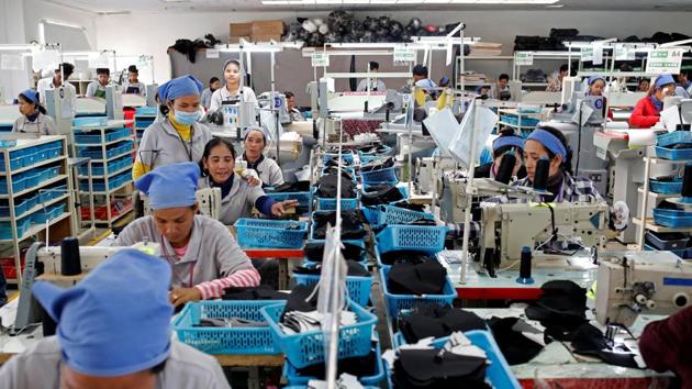 Touch is among thousands of workers in the garment industry who are being courted by Prime Minister Hun Sen ahead of the July 29 election. (Ann Wang / REUTERS) Touch is among thousands of workers in the garment industry who are being courted by Prime Minister Hun Sen ahead of the July 29 election. (Ann Wang / REUTERS)