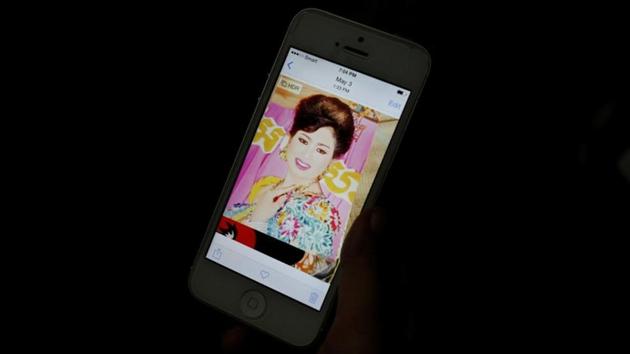A wedding picture of Touch is seen on her mobile phone. She said she knew it was important to cast her vote, but she understood little about political parties. (Ann Wang / REUTERS) A wedding picture of Touch is seen on her mobile phone. She said she knew it was important to cast her vote, but she understood little about political parties. (Ann Wang / REUTERS)