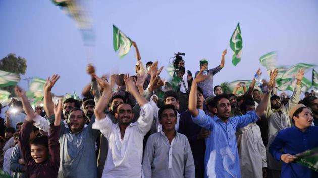 In this picture taken on July 19, 2018, supporters of Shahbaz Sharif, the younger brother of ousted Pakistani Prime Minister Nawaz Sharif and the head of Pakistan Muslim League-Nawaz (PML-N), dance and cheer to songs during an election campaign rally in Pindi Gheb in Pakistan's Punjab province.(AFP)