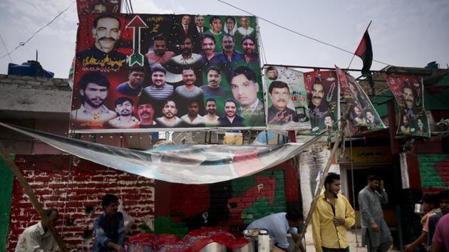 In this July 19, 2018, photo, Banners and posters of election candidates from political parties, decorated outside a compound of Christian neighborhood in Islamabad, Pakistan.(AP)