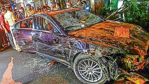 Cops from Versova police station inspect the damaged Jaguar at Versova on Monday. (Shashi S Kashyap/HT Photo) Cops from Versova police station inspect the damaged Jaguar at Versova on Monday. (Shashi S Kashyap/HT Photo)