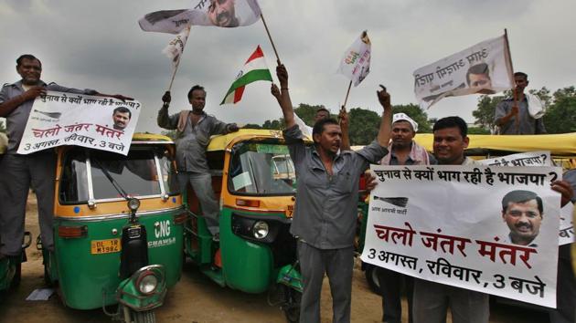 File photo of auto-rickshaw drivers at a rally addressed by Arvind Kejriwal at Ramlila Maidan in New Delhi on July 31, 2014. WIth an eye on the 2019 general elections, Kejriwal, now Delhi’s chief minister, met as many as 500 auto drivers on July 23, 2018, and assured them of increasing auto fares. (Raj K Raj / HT File Photo) File photo of auto-rickshaw drivers at a rally addressed by Arvind Kejriwal at Ramlila Maidan in New Delhi on July 31, 2014. WIth an eye on the 2019 general elections, Kejriwal, now Delhi’s chief minister, met as many as 500 auto drivers on July 23, 2018, and assured them of increasing auto fares. (Raj K Raj / HT File Photo)