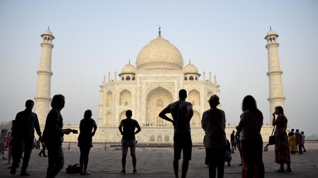 FILE - In this March 22, 2018 file photo, tourists visit famed monument of love, the Taj Mahal, in Agra. (AP) FILE - In this March 22, 2018 file photo, tourists visit famed monument of love, the Taj Mahal, in Agra. (AP)