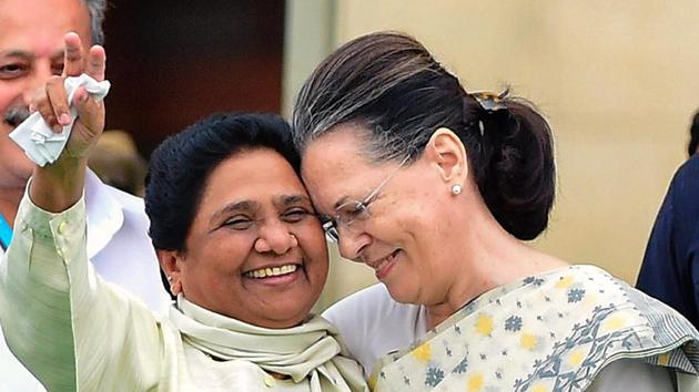Congress leader Sonia Gandhi with Bahujan Samaj Party (BSP) chief Mayawati in Bengaluru. (PTI File Photo) Congress leader Sonia Gandhi with Bahujan Samaj Party (BSP) chief Mayawati in Bengaluru. (PTI File Photo)