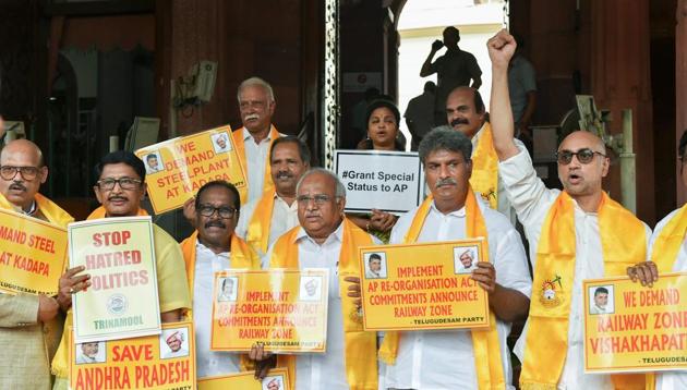 Telugu Desam Party MPs stage a protest demanding special status for the state of Andhra Pradesh, during the Monsoon session of Parliament in New Delhi on Tuesday. (PTI Photo) Telugu Desam Party MPs stage a protest demanding special status for the state of Andhra Pradesh, during the Monsoon session of Parliament in New Delhi on Tuesday. (PTI Photo)