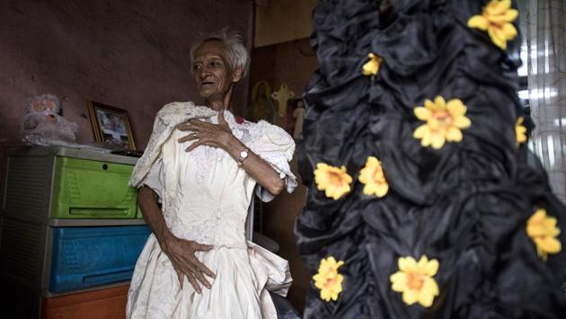“When I’m dressed like this I feel ecstatic and I feel that I don’t have any sadness in me,” said Enriquez. He added, “I’m gay and I’m not embarrassed that I’m gay.” (Noel Celis / AFP) “When I’m dressed like this I feel ecstatic and I feel that I don’t have any sadness in me,” said Enriquez. He added, “I’m gay and I’m not embarrassed that I’m gay.” (Noel Celis / AFP)