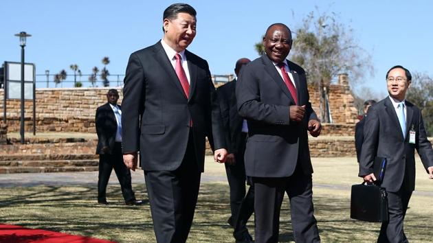 Chinese President Xi Jinping (L) and South African President Cyril Ramaphosa (R) in Pretoria on Tuesday.(AFP)