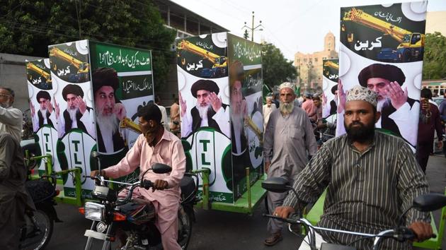 Supporters of hardline Tehreek-e-Labbaik Pakistan (TLP) ride on bikes during an election rally in Karachi. Pakistan's politicians, including PM hopeful Imran Khan, are mainstreaming extremism by invoking hardline issues such as blasphemy, analysts say. (AFP/File Photo) Supporters of hardline Tehreek-e-Labbaik Pakistan (TLP) ride on bikes during an election rally in Karachi. Pakistan's politicians, including PM hopeful Imran Khan, are mainstreaming extremism by invoking hardline issues such as blasphemy, analysts say. (AFP/File Photo)
