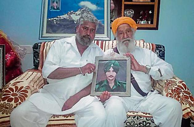 Martyr Gurmail Singh’s brother lakhwinder Singh and father Mehar Singh at their village in Nabha. (HT Photo) Martyr Gurmail Singh’s brother lakhwinder Singh and father Mehar Singh at their village in Nabha. (HT Photo)