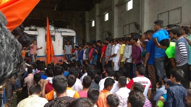 Protesters at Ghansoli Railway Station in Navi Mumbai, on Wednesday. (Bachchan Kumar/ HT Photo) Protesters at Ghansoli Railway Station in Navi Mumbai, on Wednesday. (Bachchan Kumar/ HT Photo)