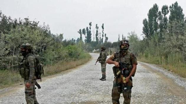 Army personnel stand guard during a gun battle with militants, who launched a pre-dawn attack on a district police complex in which three security personnel were martyred, in Pulwama of South Kashmir.(PTI File Photo)