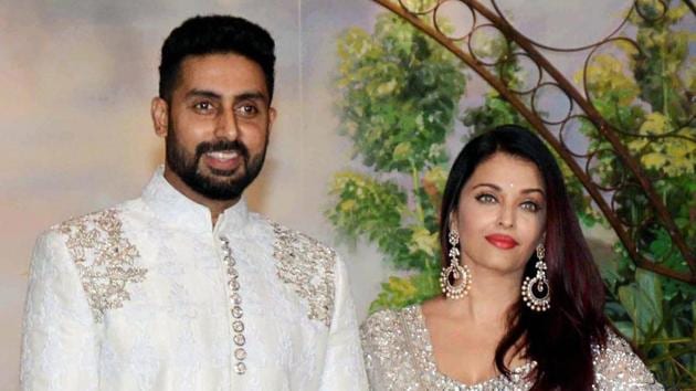 Bollywood actors Abhishek Bachchan and wife Aishwarya Rai Bachchan pose for a picture during the wedding reception of Bollywood actor Sonam Kapoor and businessman Anand Ahuja in Mumbai.(PTI) Bollywood actors Abhishek Bachchan and wife Aishwarya Rai Bachchan pose for a picture during the wedding reception of Bollywood actor Sonam Kapoor and businessman Anand Ahuja in Mumbai.(PTI)