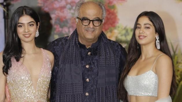 Producer Boney Kapoor along with his daughters Janhvi Kapoor and Khushi Kapoor at the wedding reception of actor Sonam Kapoor and businessman Anand Ahuja in Mumbai.(IANS)