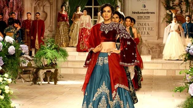 Large puffed sleeves, flowy gowns, printed lehengas paired with muted blouse were some of the highlights of designer Anju Modi’s collection at the India Couture Week 2018.(Raajessh Kashyap/HT Photo)