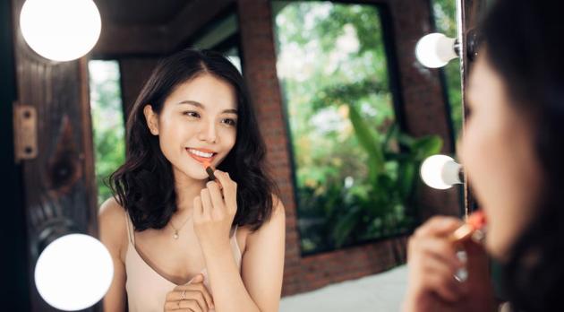 Women with a fair skin tone can pull off any shade of lipstick. Lighter shades of peach, pink or nudes go well during the day.(Shutterstock)