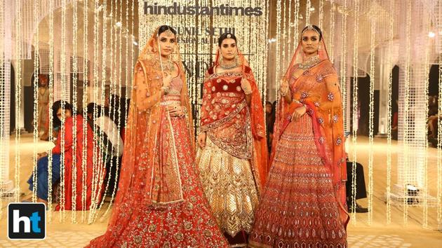 Tahiliani’s collection made a case for lehengas, anarkalis, sharara sets and sarees in super calming blues, reds, pinks and a whisper of ivory. (Raajessh Kashyap/HT Photo)