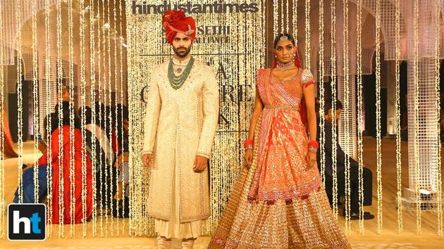 His collection included detailed applique on the panel of bridal and cocktail lehengas, concept saris, gowns, jackets, and modern saris layered in multi-dimensional detailing. (Raajessh Kashyap/HT Photo)