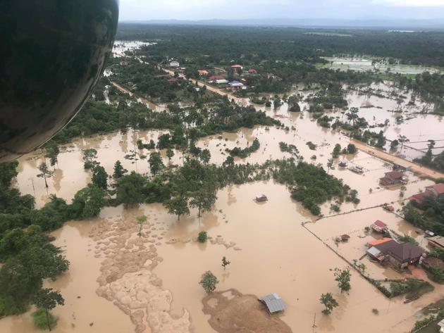 An aerial view shows the flooded area after the dam collapsed. The $1.2 billion dollar Xe-Namnoy dam, a joint venture between Laos and Korean companies, was still under construction in southern Attepeu province when it collapsed after heavy rains pounded the area earlier this week. (Mime Phoumsavanh / REUTERS) 