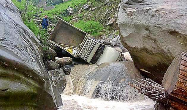 A vehicle carrying eight people, including the driver, overturned and fell into the the Kalp Ganga river near Helang in Joshimath sub-division of Chamoli district . Five passengers were injured and three missing. (Uttarakhand State Disaster Response Force photo) A vehicle carrying eight people, including the driver, overturned and fell into the the Kalp Ganga river near Helang in Joshimath sub-division of Chamoli district . Five passengers were injured and three missing. (Uttarakhand State Disaster Response Force photo)