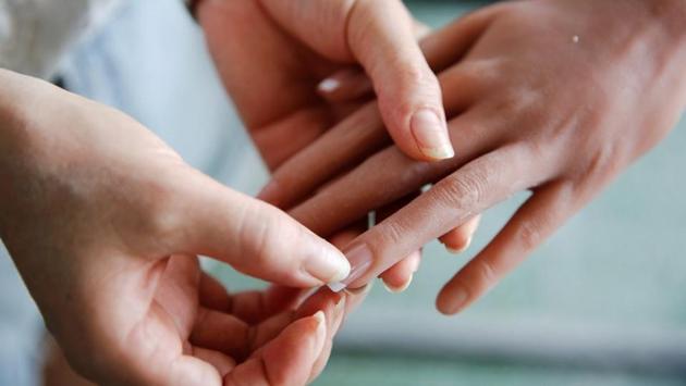 A worker attaches a nail to a doll's finger. The firm admits improving the features has been difficult partly because experts aren’t interested in putting much effort into developing AI technology for adult products. (Aly Song / REUTERS) A worker attaches a nail to a doll's finger. The firm admits improving the features has been difficult partly because experts aren’t interested in putting much effort into developing AI technology for adult products. (Aly Song / REUTERS)