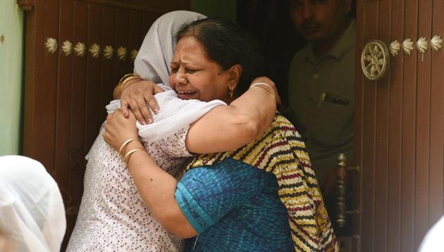 Relatives mourn the death of 11 members of a family in north Delhi’s Burari, July 1, 2018.(Raj K Raj/HT File Photo)