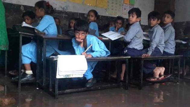 Students during a class at Government Elementary School in Bahadurgarh village, Patiala. (HT Photo) Students during a class at Government Elementary School in Bahadurgarh village, Patiala. (HT Photo)
