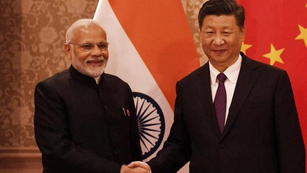 Prime Minister Narendra Modi with Chinese President Xi Jinping during a meeting in Johannesburg, South Africa, Thursday. (PTI) Prime Minister Narendra Modi with Chinese President Xi Jinping during a meeting in Johannesburg, South Africa, Thursday. (PTI)