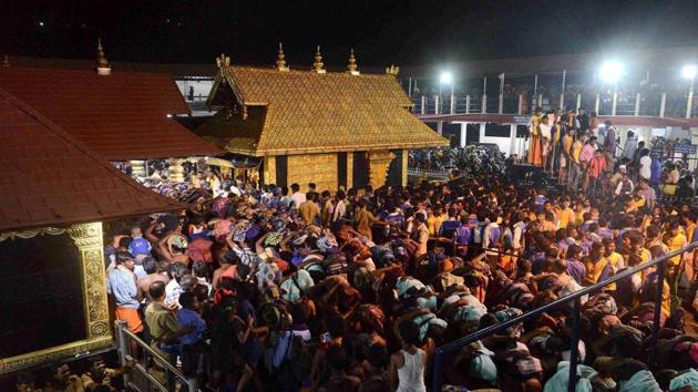 Devotees crowd at the Sabarimala temple in Kerala. (PTI file photo) Devotees crowd at the Sabarimala temple in Kerala. (PTI file photo)