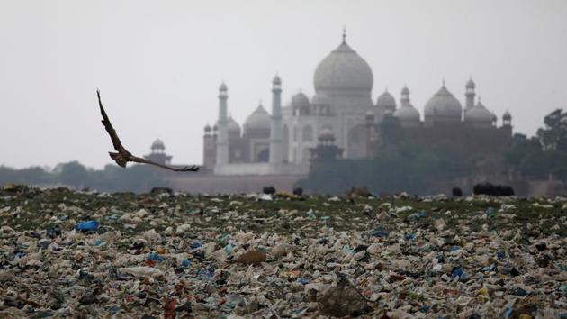 Garbage is seen on the polluted banks of the river Yamuna near the historic Taj Mahal in Agra.(Reuters File Photo) Garbage is seen on the polluted banks of the river Yamuna near the historic Taj Mahal in Agra.(Reuters File Photo)